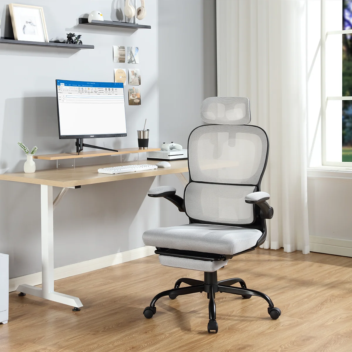 Mainstays Ergonomic Height Adjustable Mesh Office Chair for Teens and Adults with Lumbar Support and Tilt Function, with Leg Rest, Black